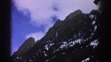Aspen Colorado USA (1961): Driving Through The Mountains With Snow On A Sparsely