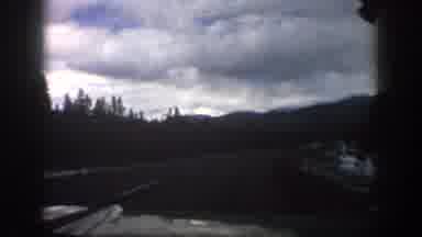 Aspen Colorado USA (1961): Tree Cloud Windshield Car Going The Speed Limit Snow