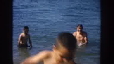 California USA (1952): Three People Splashing In Lake Water, Colorful Miss