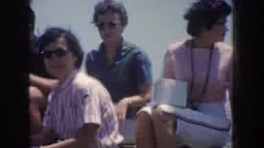 California USA (1952): Group Of People Viewing Outdoor Garden On A Bright Sunny