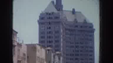 California USA (1952): Outside View Of Buildings In City With People Walking