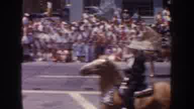 California USA (1952): Men Wearing Cowboy Hats Riding Horses And Triumphant Young