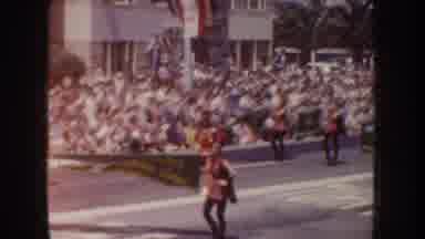 California USA (1952): A Marching Band And Dancers In A Parade Walking Down The