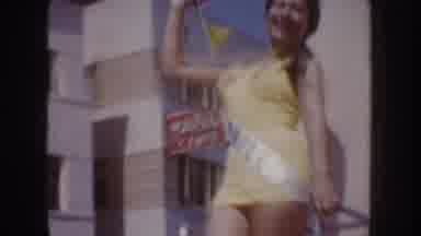 California USA (1952): Pin-Up Girls In Bathing Suits Wave To Fans At Parade In