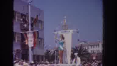 California USA (1952): Woman Waves From Top Of Commemorative Car In Civic Parade