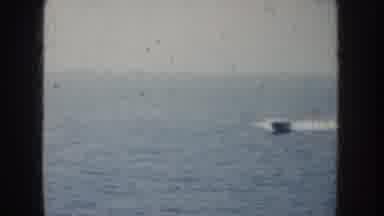 California USA (1952): Boats Speeding Through The Water Seen From A Ship