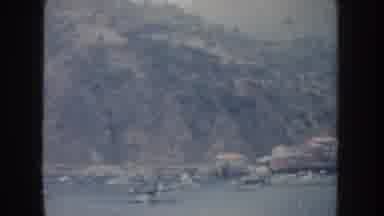 California USA (1952): Swimmers Enjoy The Clear Waters On A Busy Day At The Lake