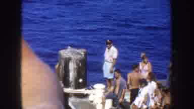 California USA (1952): Group Of People Watching As The Ocean Water Is Moving On
