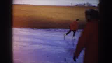 North Dakota USA (1953): Three People Ice Skating On A Clear Sunny Winter Day