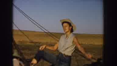 South Dakota USA (1953): Country Girl Working In Field With Cowgirl Boots Getting