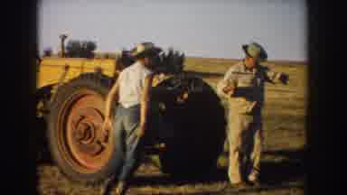 South Dakota USA (1953): Farmers Tractors Work Haul Outside Hats Boots Jeans Tools