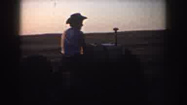 South Dakota USA (1953): A Woman Is Reading Out Loud From A Book, And A Man In A