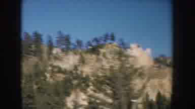 South Dakota USA (1953): Someone Videoing Mountain Sides Covered In Tall Skinny
