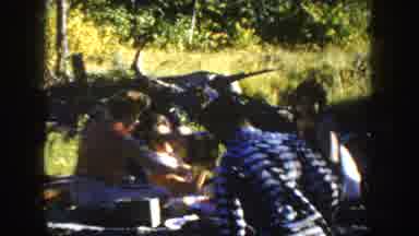 South Dakota USA (1954): People In The Bush With Horse Saddles On A Sunny Day And