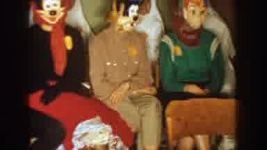 South Dakota USA (1954): Panning Shot Of Various People Wearing Masks In Crowded