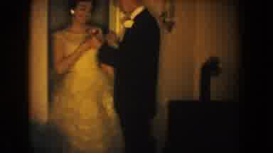 South Dakota USA (1954): Husband And Wife Getting Ready For A Party