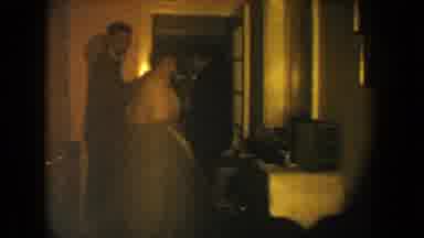 South Dakota USA (1954): Wedding Couple Turns Away In Dim Room Cuts To People By A