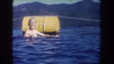 South Dakota USA (1954): Young Boys Swimming In Freshwater Lake Surrounded By