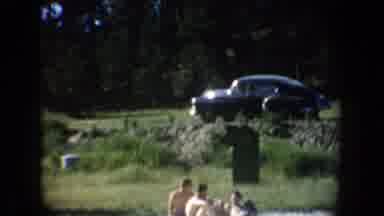 South Dakota USA (1954): Swimming Woman Bathing Cap Shocked Car Driving Beach