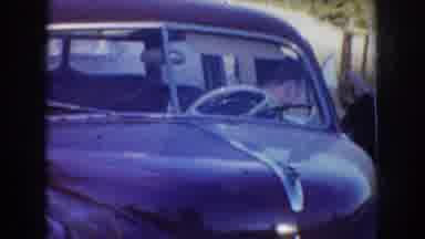 Idaho USA (1955): Driver Stopping Car Allowing Tame Donkeys And Owner To Pass