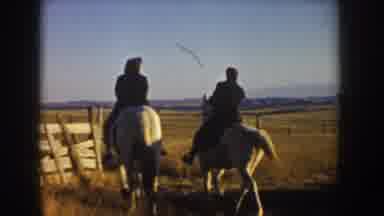 Idaho USA (1955): The Two Persons Are Going To Horse Tired Some Distance