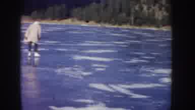 Idaho USA (1955): Family Ice Skating On A Lake
