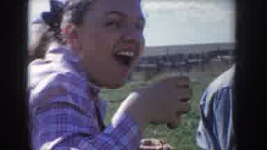 Idaho USA (1955): A Girl Smiling And Take A Cup Of Coffee And Eating