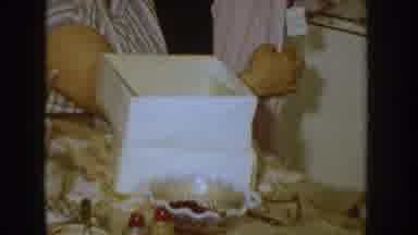 Idaho USA-1955: Woman Unpacking New Outfit From Joy Box