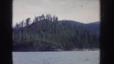 Idaho USA (1955): Grassland Is Viewing On The Seashore Side With Mountains