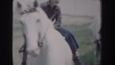 Idaho USA (1955): Boy Riding Horse In A Meadow And Close Up Of Boy On The Horse