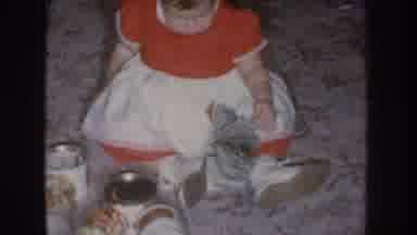 Nebraska USA (1955): Messy Girl Having Fun With Mom's Shopping And In Red Dress