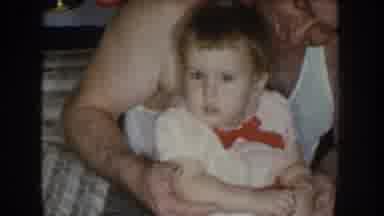 Nebraska USA (1955): Father Playing With His Baby And Excited For His Tenderness
