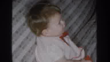 Nebraska USA (1955): Happy Baby Sitting On A Armchair