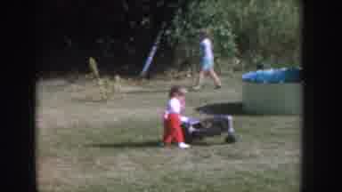 Nebraska USA (1955): Family Enjoys Gathering With Food Among Young, Playful