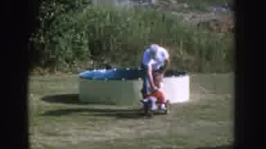 Nebraska USA (1955): Children Playing With Bicycle