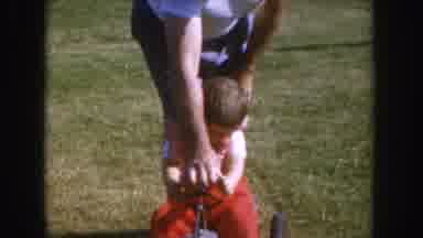 Nebraska USA (1955): Child Playing In The Park And Rocking A Chair In The Park