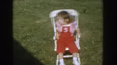 Nebraska USA (1955): Baby Agitated Speaks Something While Sitting Chair