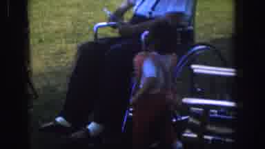 Nebraska USA (1955): Man In Wheelchair Ignores Little Girl Trying To Gain His