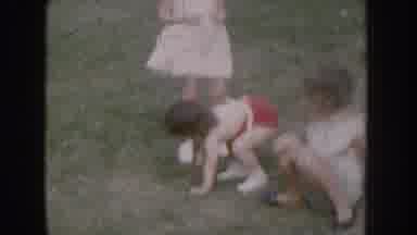 Nebraska USA (1955): Kids Playing In An Old Film, Child Aggressively Playing With