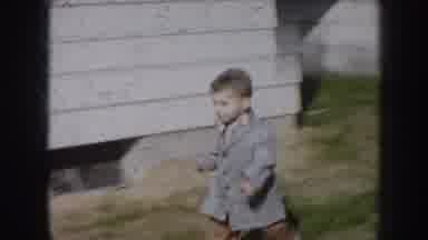 Nebraska USA (1956): Child Playing With Dad