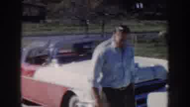 Nebraska USA (1956): Two Mans Talking With The Child