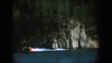 South Dakota USA (1956): Person Using A Boat To Boat Ski On A Lake By A Forest