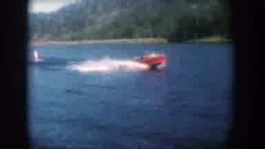 South Dakota USA (1956): A Boat Pulling A Water Skier On A Body Of Water In The