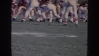 Nebraska USA (1957): Amateur Or Youth Football Game With People Watching From Hill