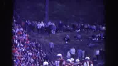 Nebraska USA (1957): Outdoor Game With Many Watching With Their Family Waiting For
