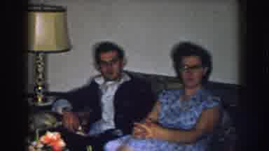 Nebraska USA (1957): People Sitting In The Sofa