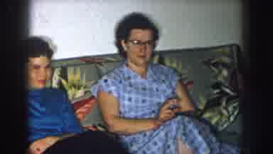 Nebraska USA (1957): Two Women In Nice Dresses Sitting On The Couch Together And