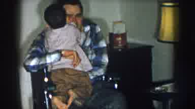 Nebraska USA (1957): Cute Little Boy Gives His Family Member A Enormous Amount Of