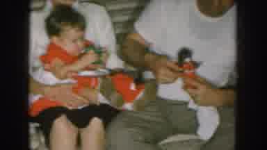 Nebraska USA (1957): Family Christmas Scene Where Mom Holding Little Baby While