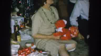 Nebraska USA (1957): One Lady Is Sitting With The Doll And The Other Men Are Near